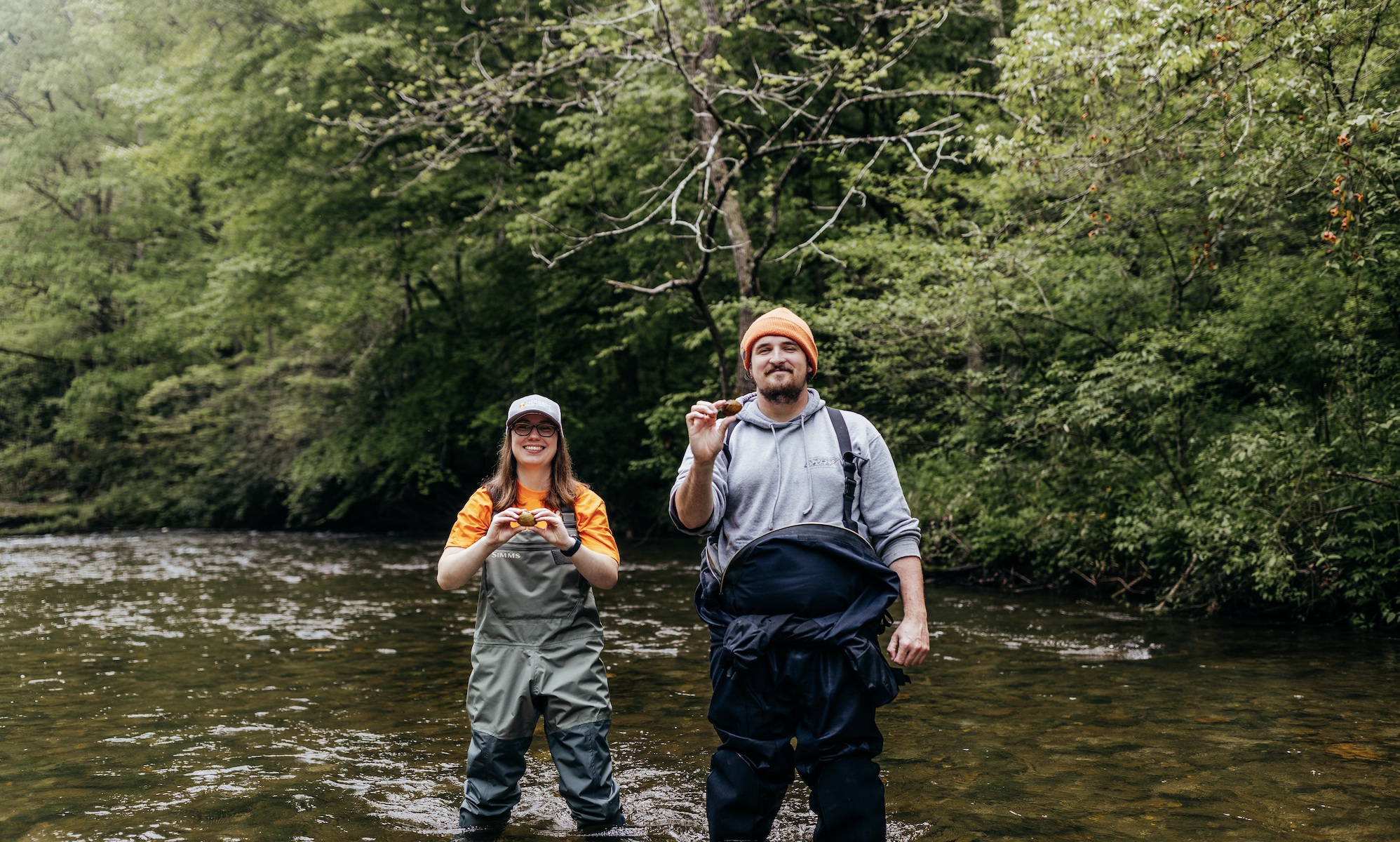 Two students at Abrams Creek identifying mussel species